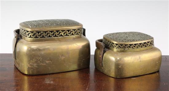 Two Chinese bronze hand warmers, 18th / 19th century, 17cm and 20.5cm, repair to smaller cover